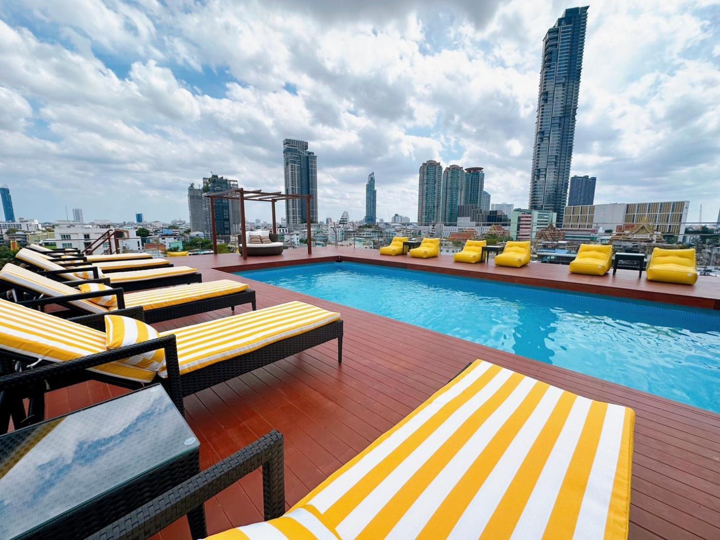 Miloft Sathorn Hotel - Sha Plus Certified Bangkok Exterior photo Rooftop pool at the hotel